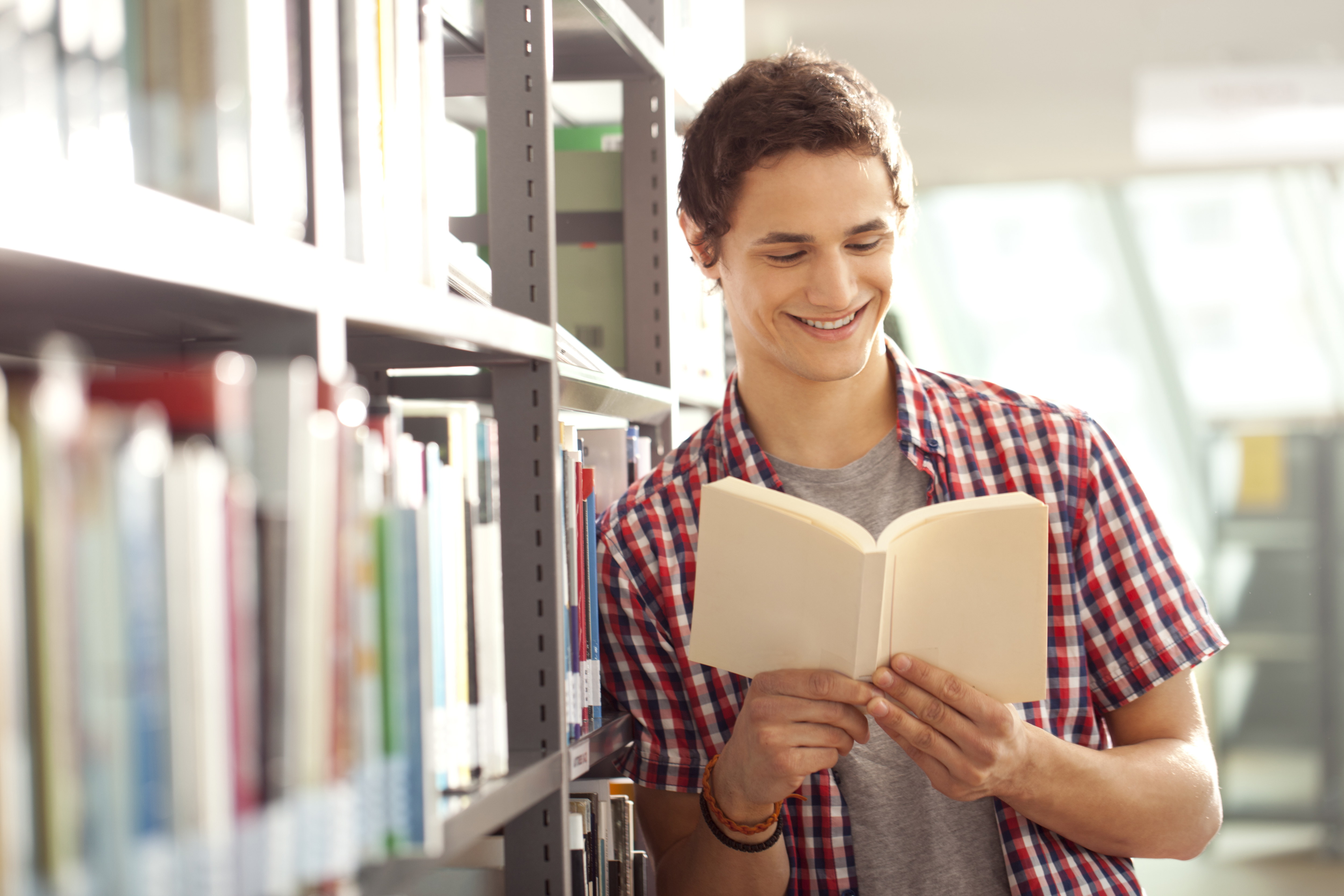 Read these books. Студент несет книги. Студент с телефоном. Подготовка к ЕГЭ В библиотеке. Студент оформляет.